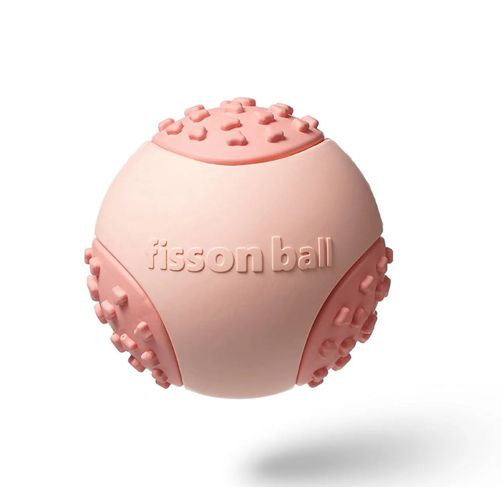 Green and pink rolling ball dog toy with 64mm diameter for small and medium dogs.