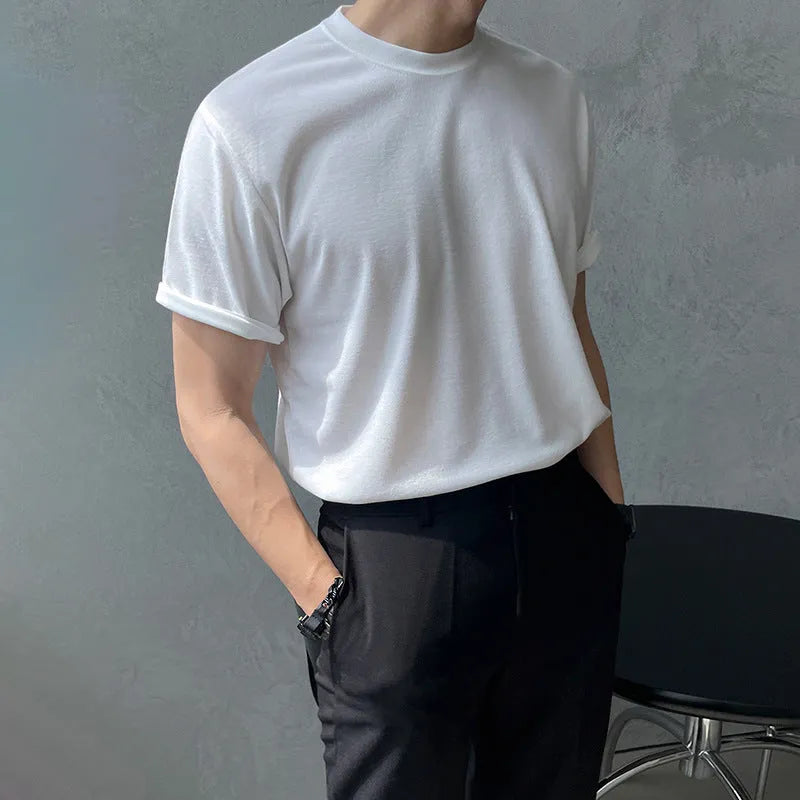 Men's slim fit black cotton t-shirt with round neck and half sleeves on a hanger