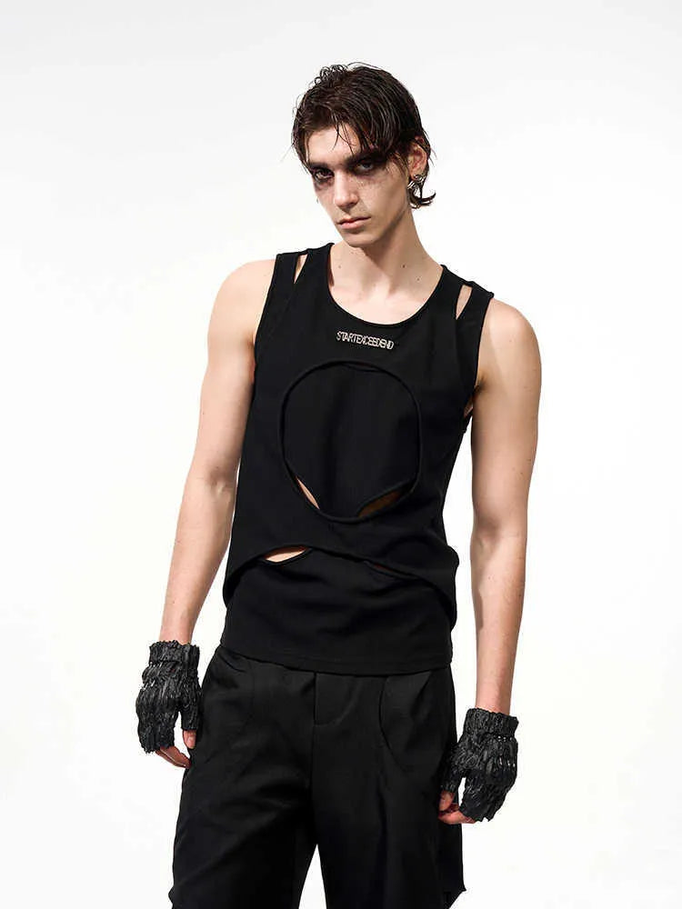 Men's loose black and white hollow knit sleeveless summer vest on a hanger.