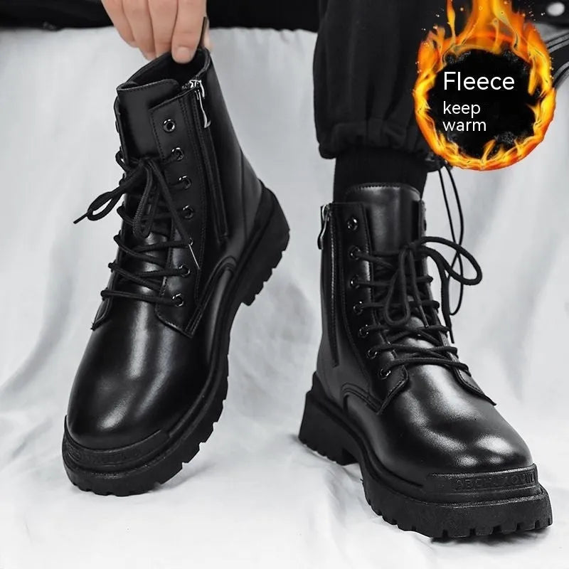 Men's mid-top black waterproof leather boots with non-slip rubber sole on flat surface