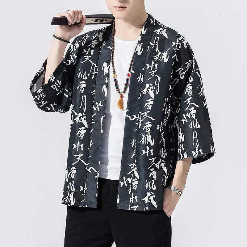 Japanese kimono cropped sleeve cardigan in black shown front view on a model