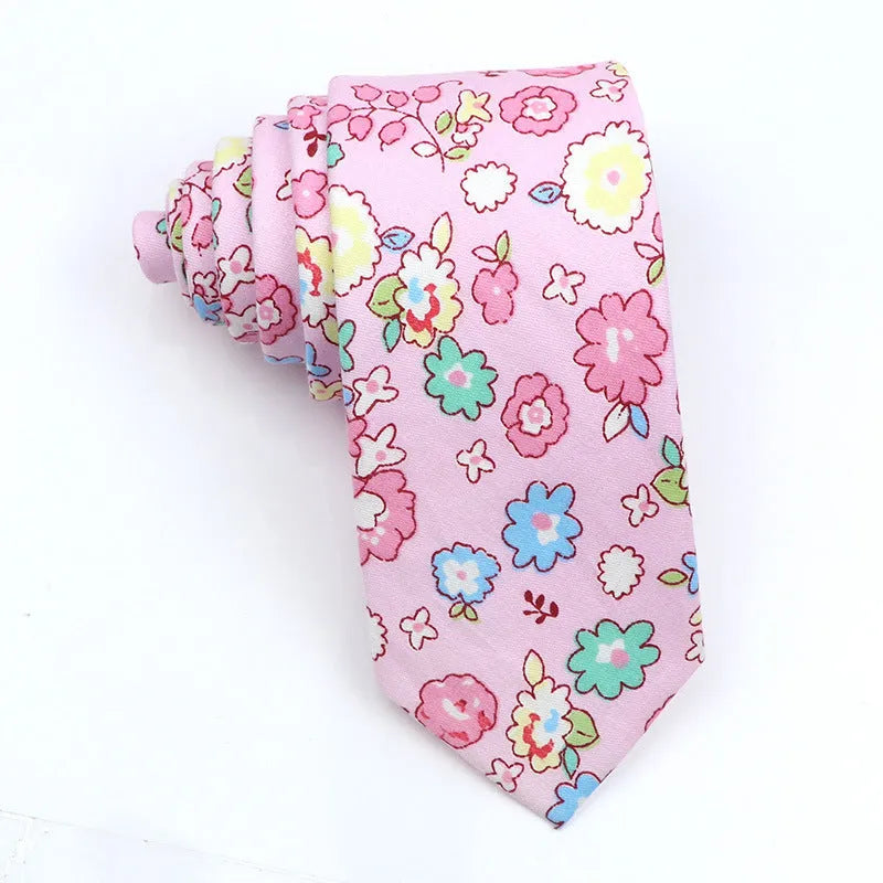 Men's narrow cotton bow tie in a cartoon print with an adjustable knot, shown in a selection of colours.