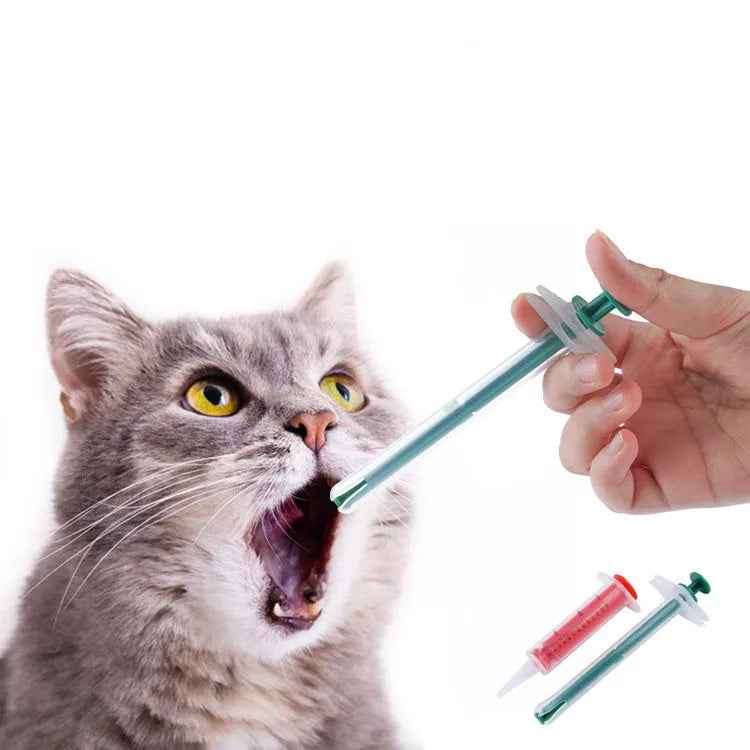 Two silicone pet pill shooter syringes with soft tips, one longer than the other, for administering tablets.