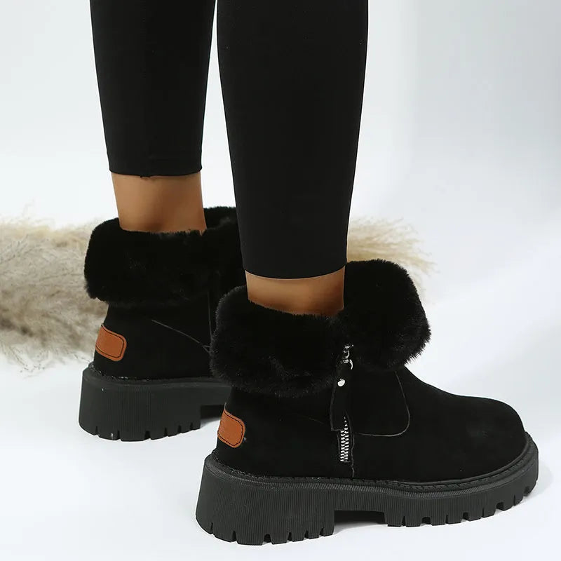 Women's black thick plush high top snow boots with side zipper and round toe on a rubber sole.