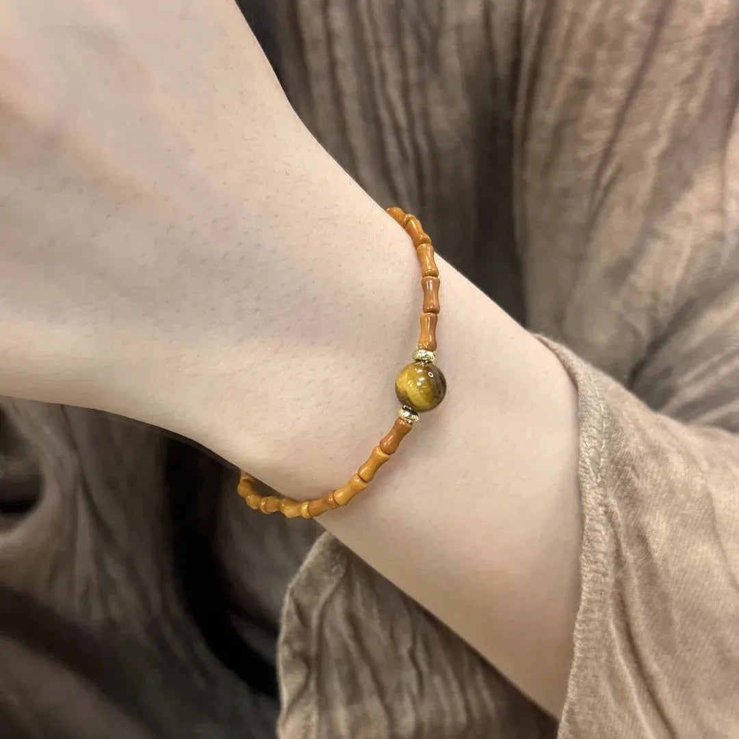 Natural yellow tiger's eye Hetian jade bracelet with U-shaped design and diamond treatment