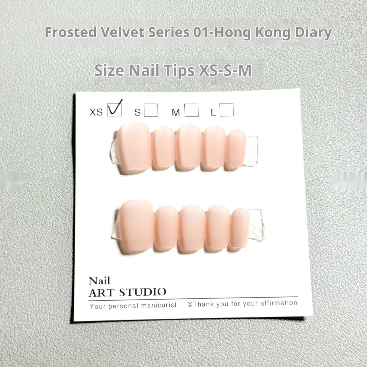 Set of frosted velvet Cat's Eye press-on false nails showing short ladder sizes XS, S, and M.