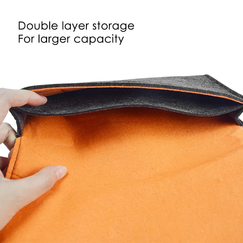 Black felt pouch case for Nintendo Switch showing game card slots and double layer storage compartments