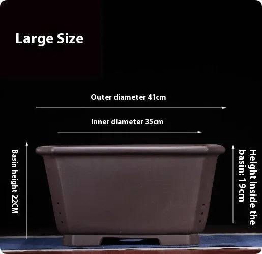 Large Chinese-style purple clay flower pot for indoor bonsai and plants.