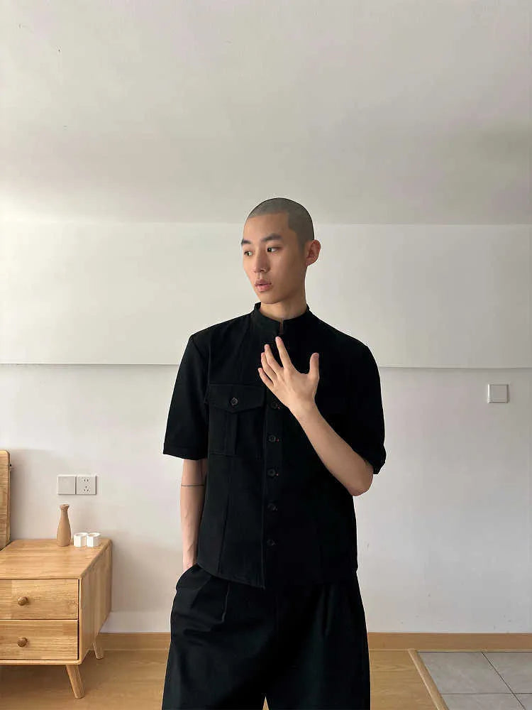 Handmade black half-sleeve hunting shirt with a shirt collar and single-breasted placket.