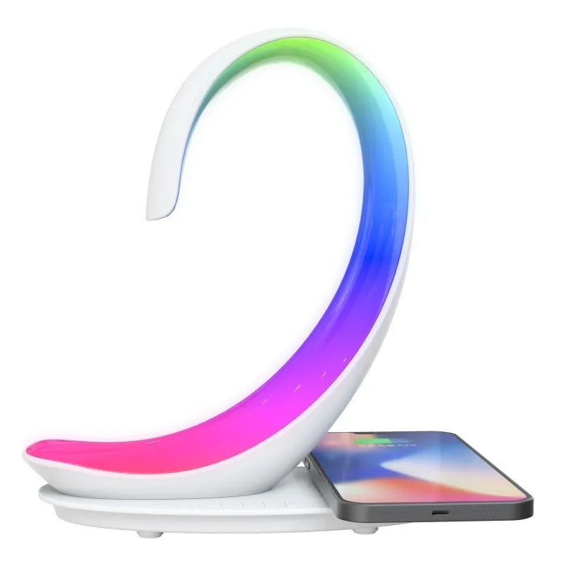 White swan-shaped desktop lamp with wireless charging pad, Bluetooth speaker and colourful atmospheric lighting effects