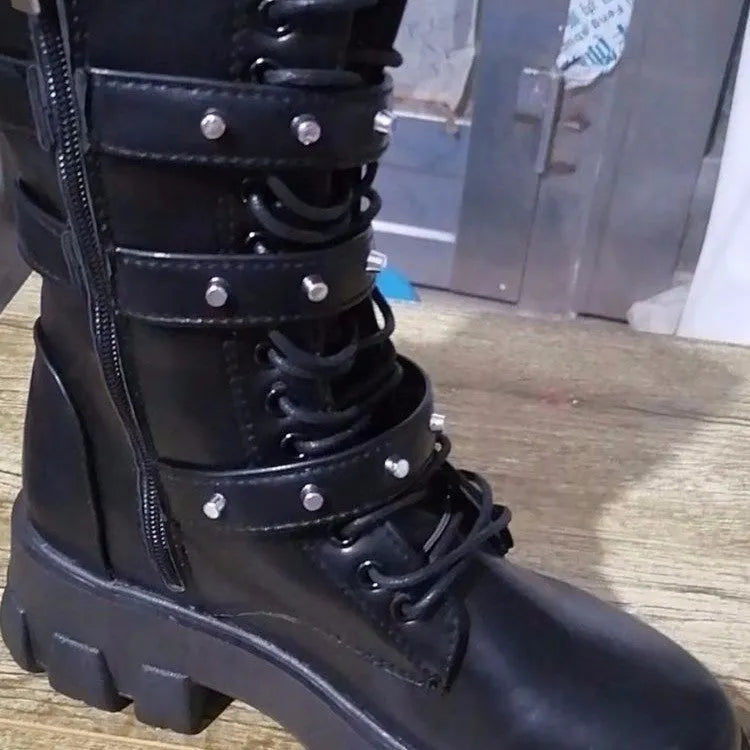 Women's black mid-calf knight boots with metal buckle detailing and side zipper closure