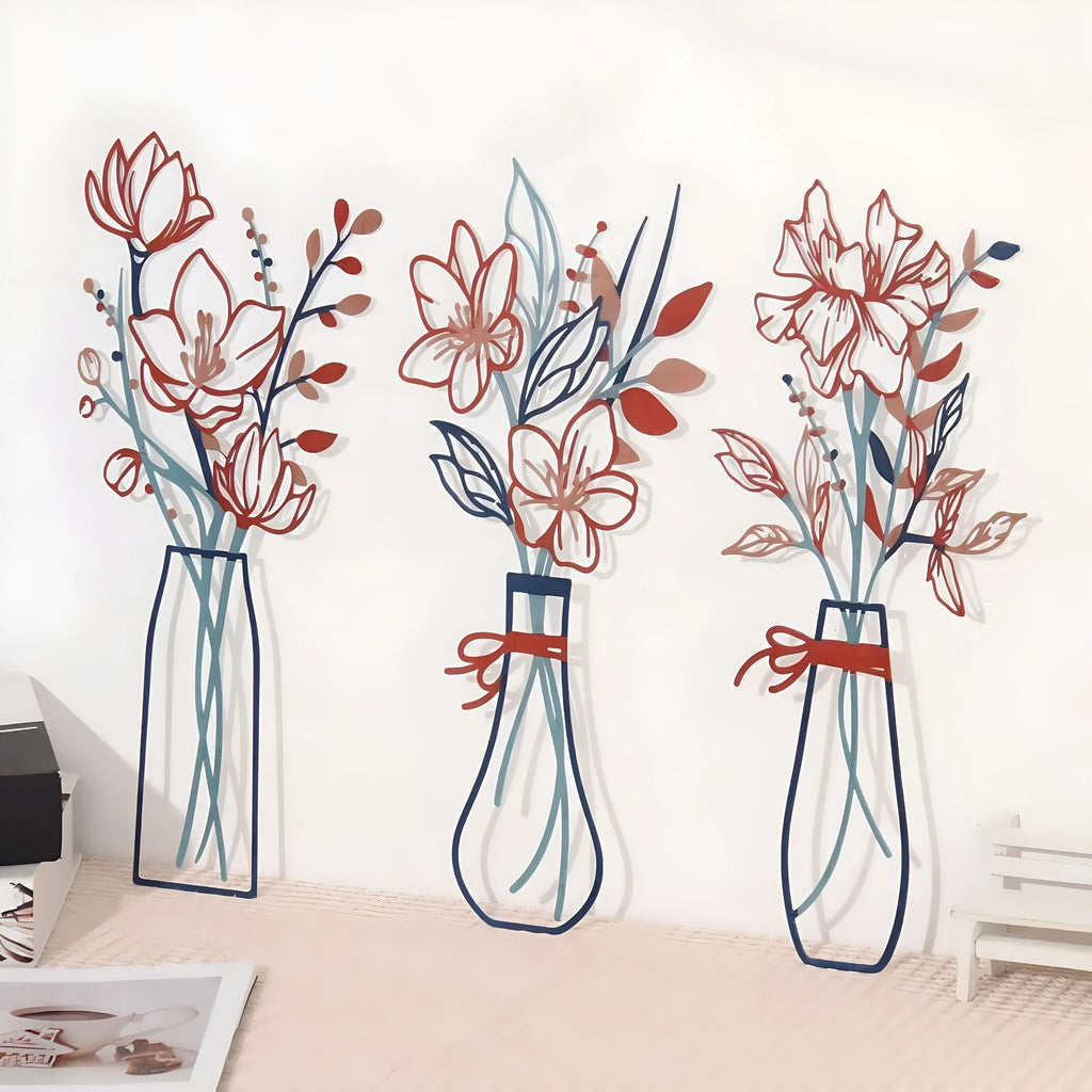 Set of three modern metal flower and vase wall art decorations in a choice of four colours.