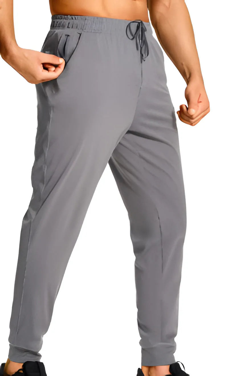 Men's loose fit casual trousers in polyester fabric available in multiple solid colours and sizes