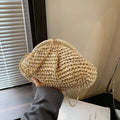 Khaki straw shoulder bag with shell shape design and internal zipper pocket