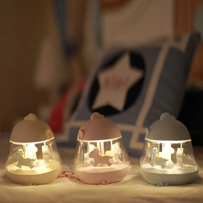 USB carousel music light with rotating Trojan, touch controls, warm yellow and colourful gradient light, in blue pink and yellow options