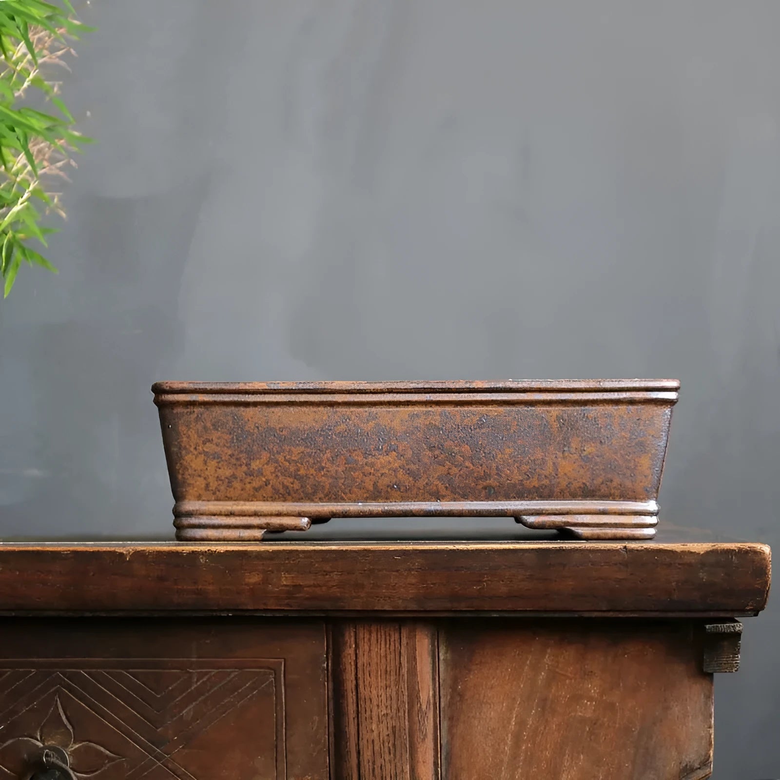 Purple sand rectangular bonsai basin shown in two sizes for floor-standing plant display.