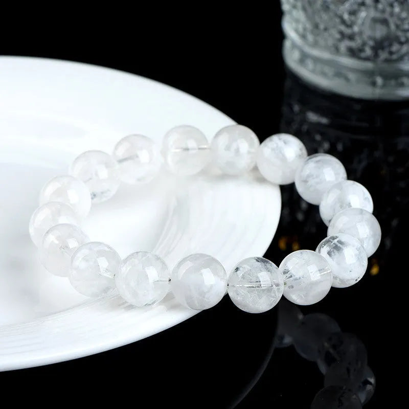 Women's crystal bracelet with natural blizzard snowflake round beads featuring Ruyi and Xiangyun traditional design elements