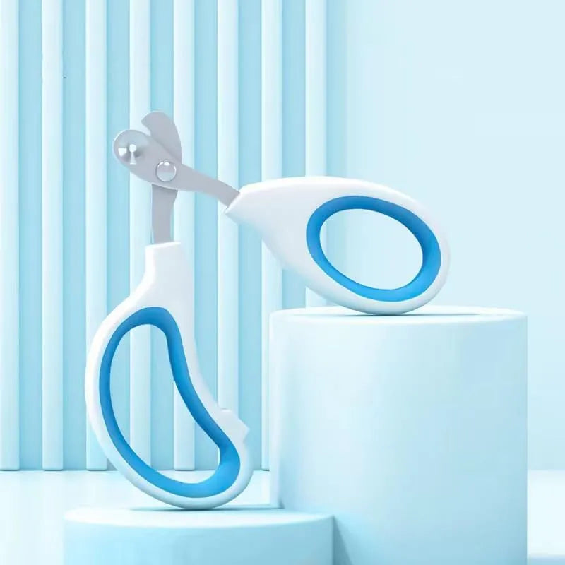 Blue professional cat nail clippers with circular safety hole and cushioned non-slip handles.