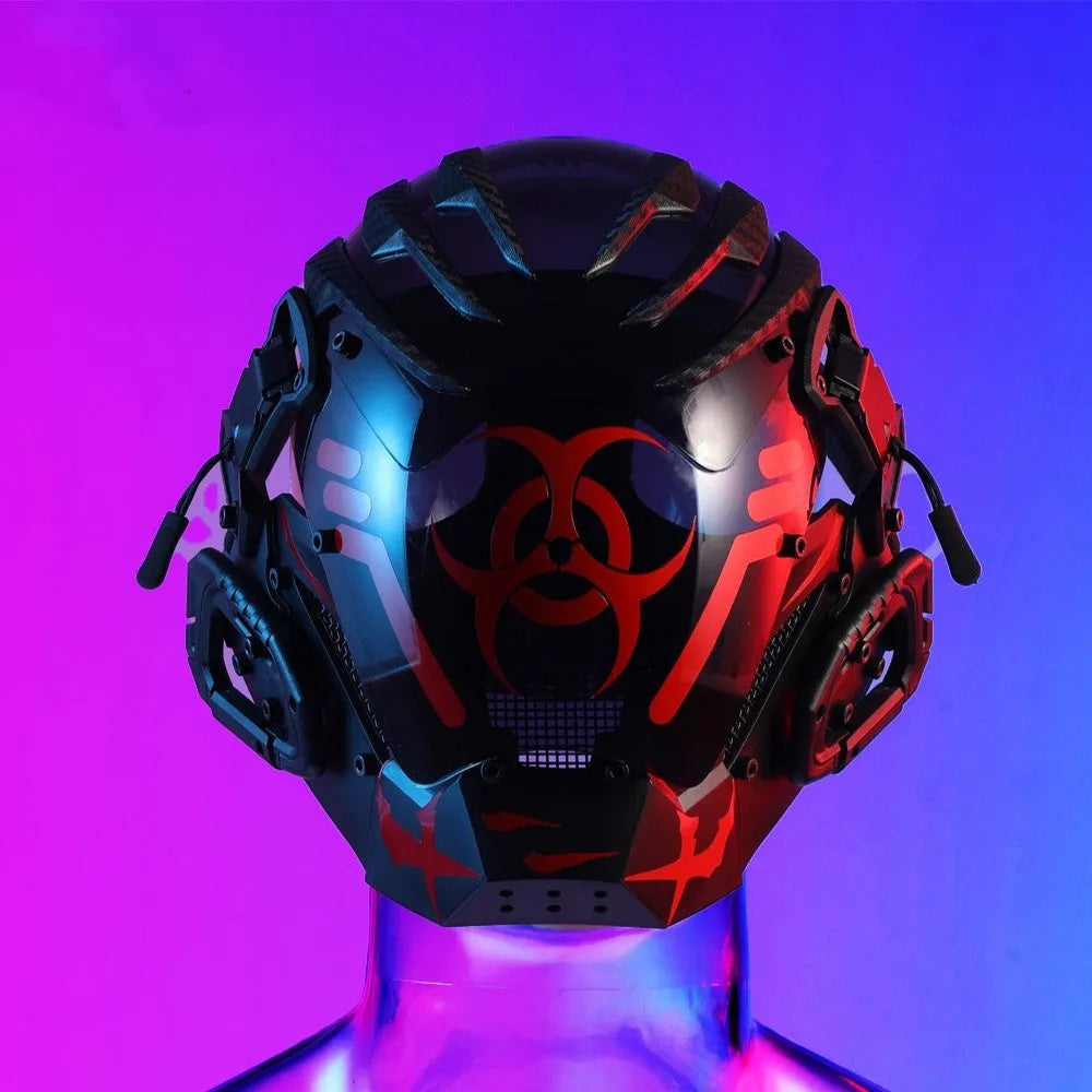 Black full-face cybernetic prop helmet with sci-fi design on a model or stand.