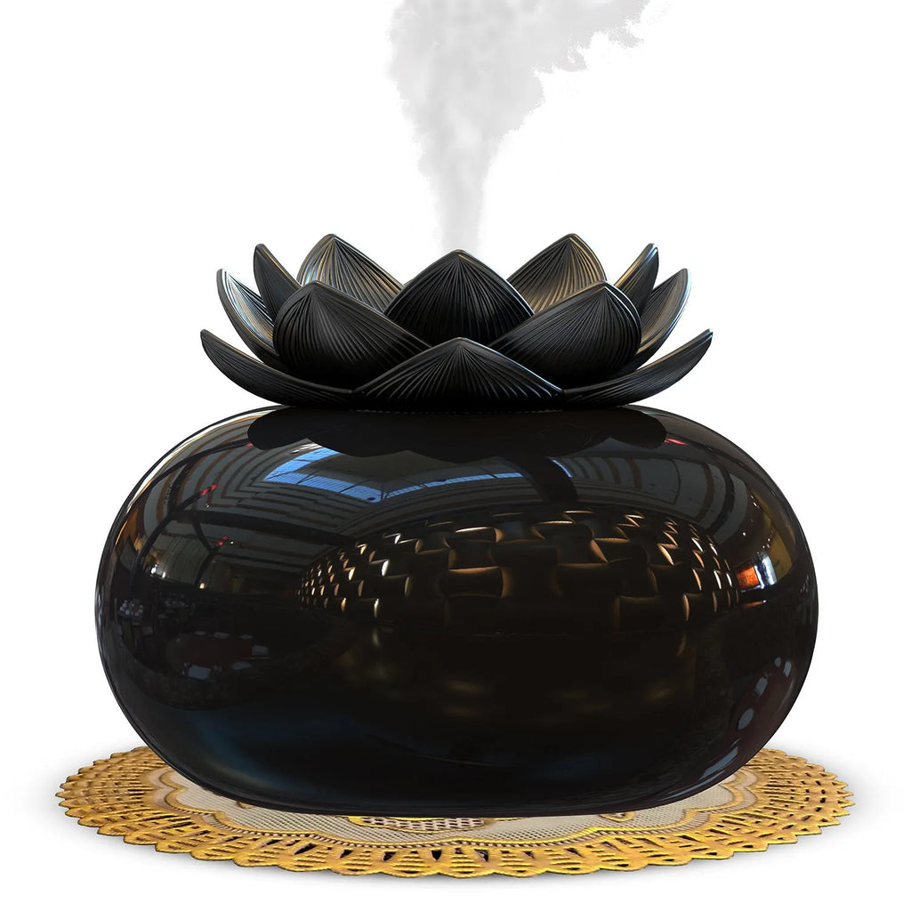 Pure black Lotus ultrasonic aromatherapy humidifier with round shape and USB cable.