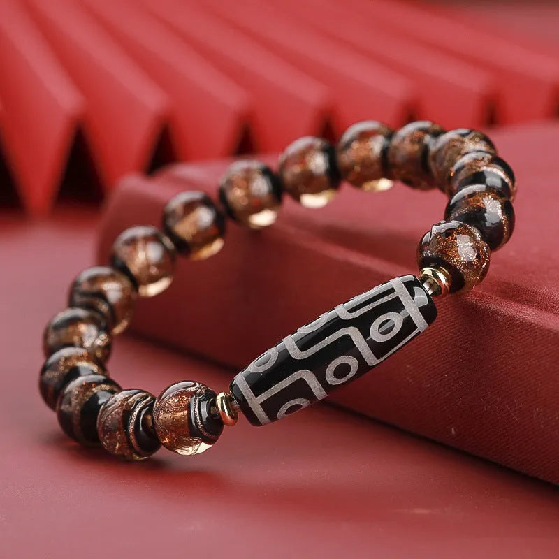 Handcrafted Chinese coloured glaze bracelet with snake year beads in auspicious patterns