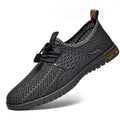 Men's grey mesh casual slip-on shoes with elastic band and rubber sole.