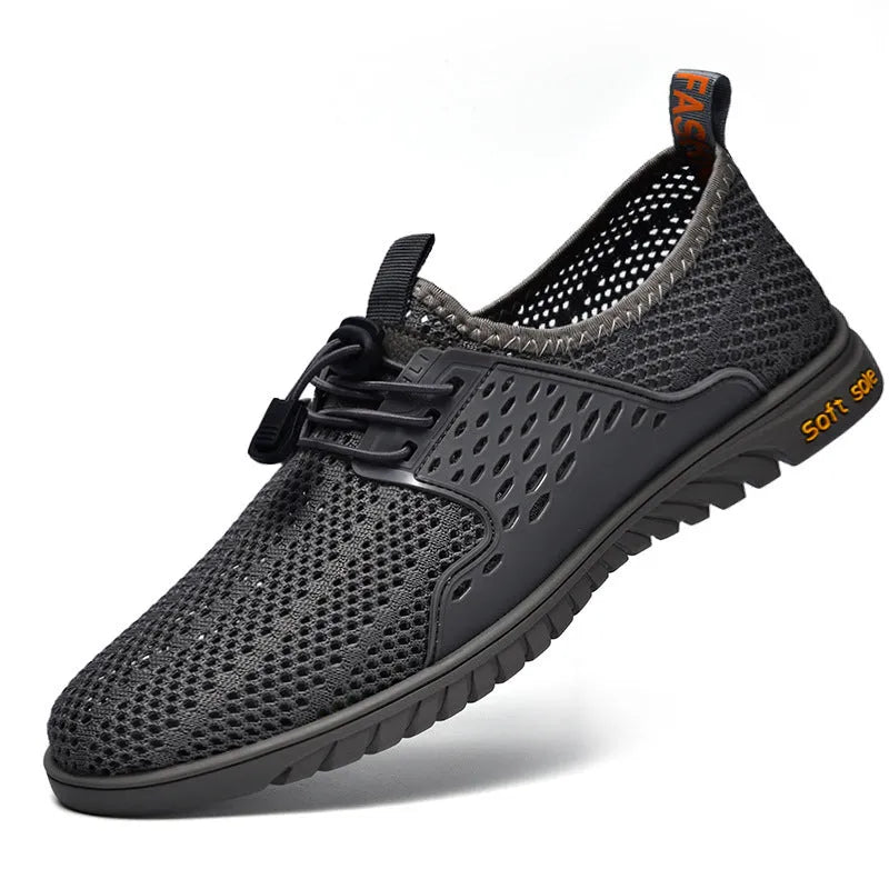 Men's grey mesh casual slip-on shoes with elastic band and rubber sole.