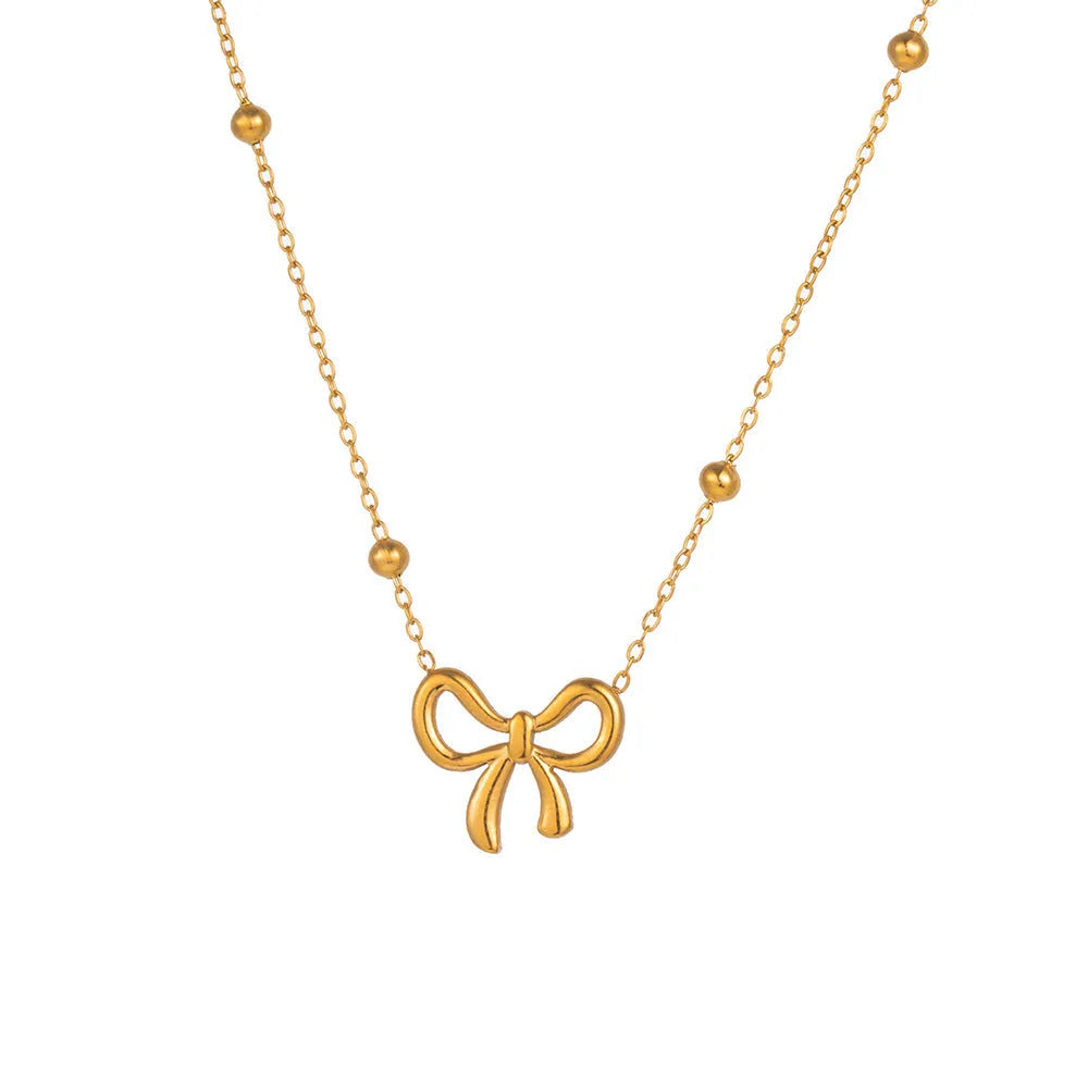 Gold titanium steel bow necklace with cross chain style for women