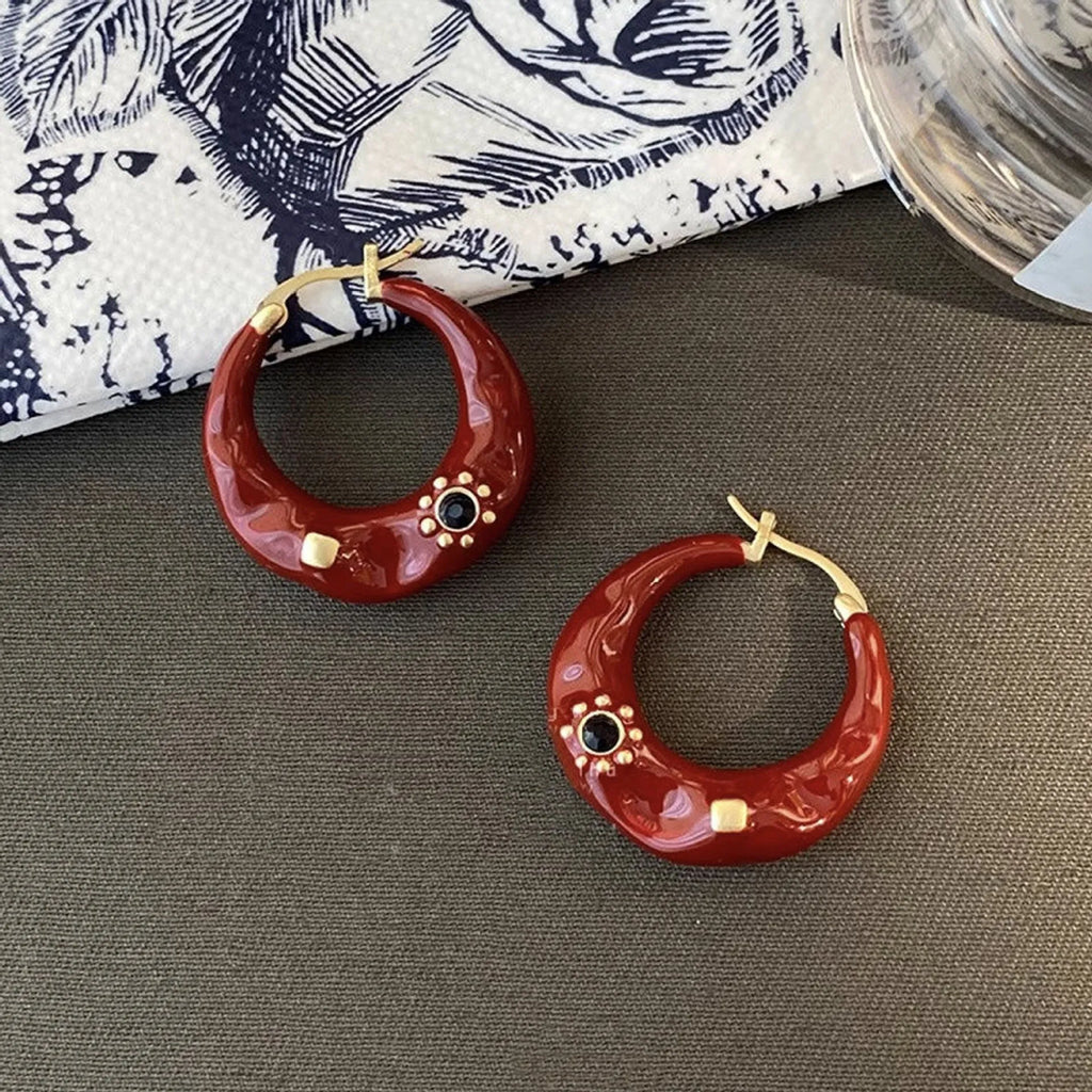 Hong Kong style retro ear studs with rhinestone decoration and dripping oil finish in black and red colour options
