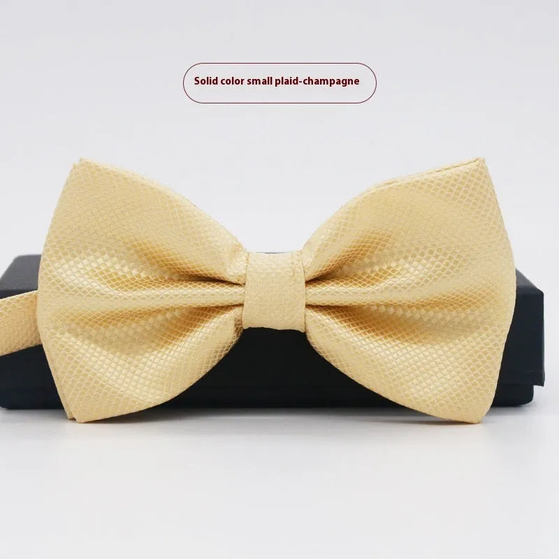 Solid colour flat head bow tie for formal wear in multiple colours including black, red, and blue.