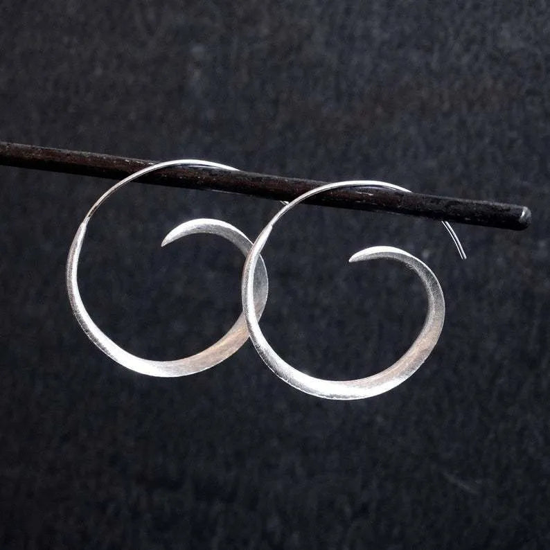 Gold and silver alloy round spiral leaf design ear studs with geometric pattern for women