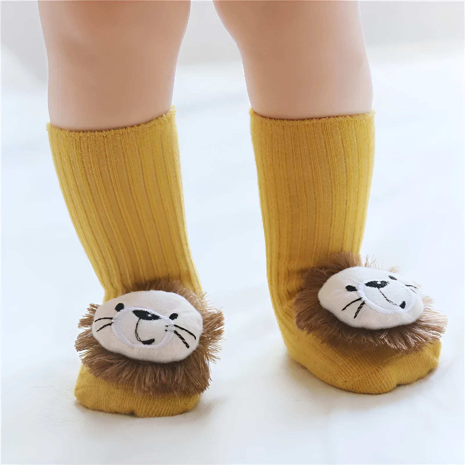 Cotton baby floor socks in various colours and patterns with size guide for ages 0-3 months
