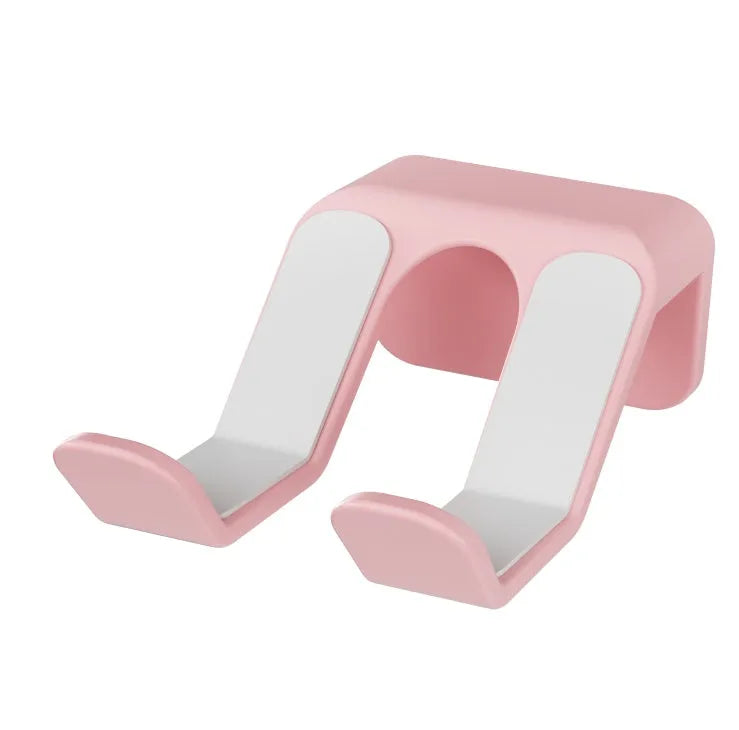 Universal non-perforated game handle wall hanging rack in black, white, or pink colour for organising controllers and headsets