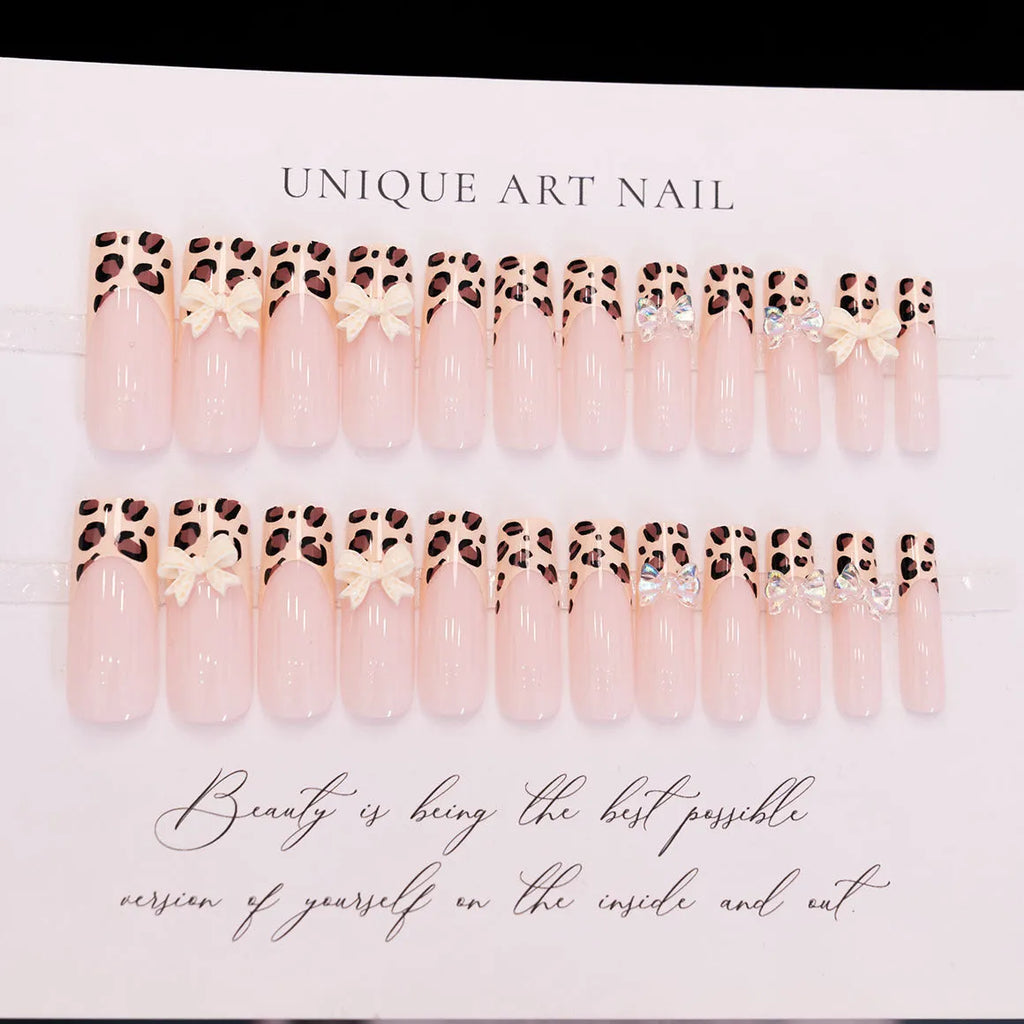 Leopard print false nail set with butterfly designs in WM296 colour