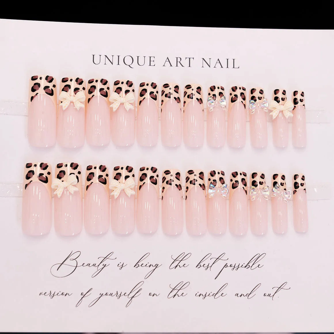 Leopard print false nail set with butterfly designs in WM296 colour
