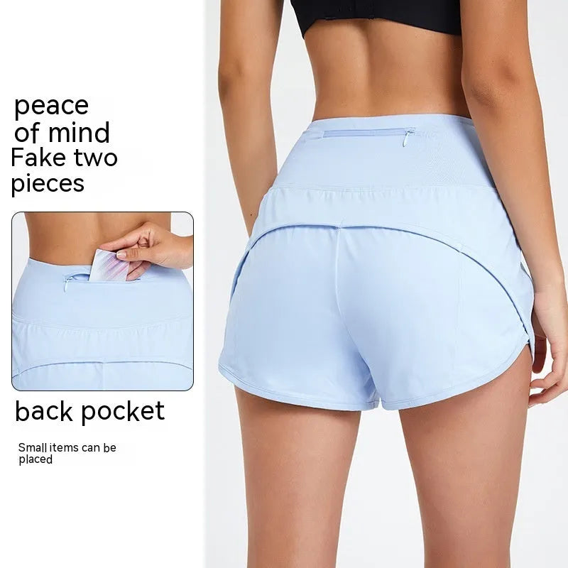 Women's high-waist nylon fitness shorts in black, white, and water blue colours