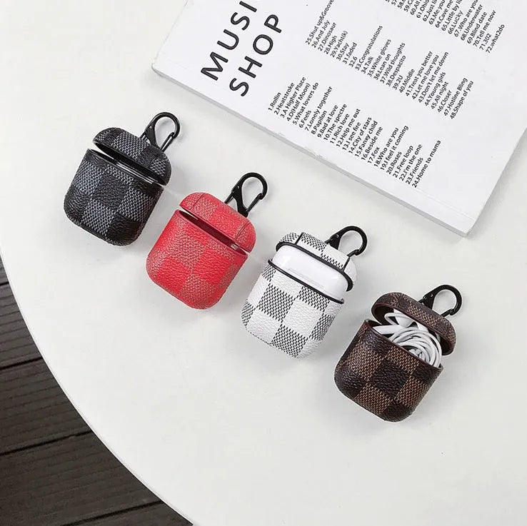 iPhone XS Max hard shell plastic case with grid pattern and integrated hook for Apple AirPods 2nd gen case.
