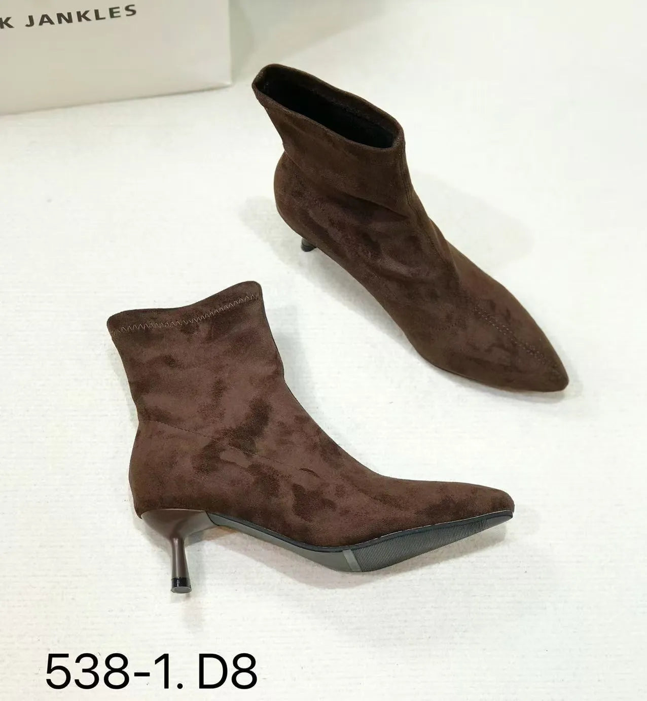 Black pointed toe women's ankle boots with stiletto heel and mid-calf height