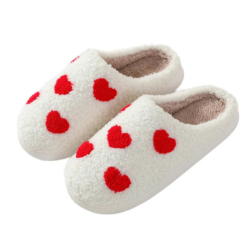 Women's plush slippers with cartoon love patterns and PVC non-slip soles in multiple colour options