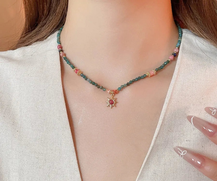 Freshwater pearl sun necklace on clavicle chain in court style, blue-sun colour option.