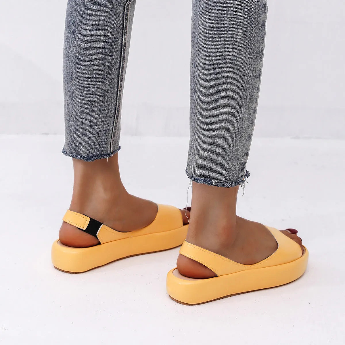 Women's flat sandals with fish mouth toe, back strap, side hollow, artificial PU upper, rubber sole, solid colour