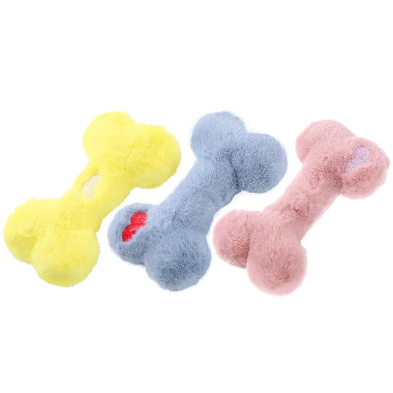Blue Love Bone shaped plush dog toy with a squeaker on a white background.