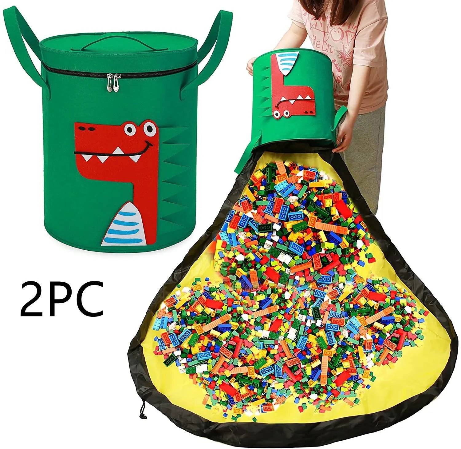 Green felt cube storage bag with pull rope, laid flat as a play mat for toys.