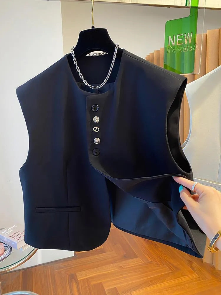 Loose-fitting waistcoat dress in beige with pocket detailing showing 40cm length