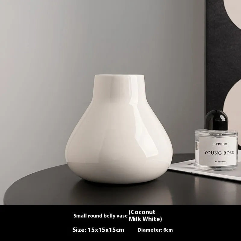 Ceramic decorative vase with orchid flowers in modern simplicity style