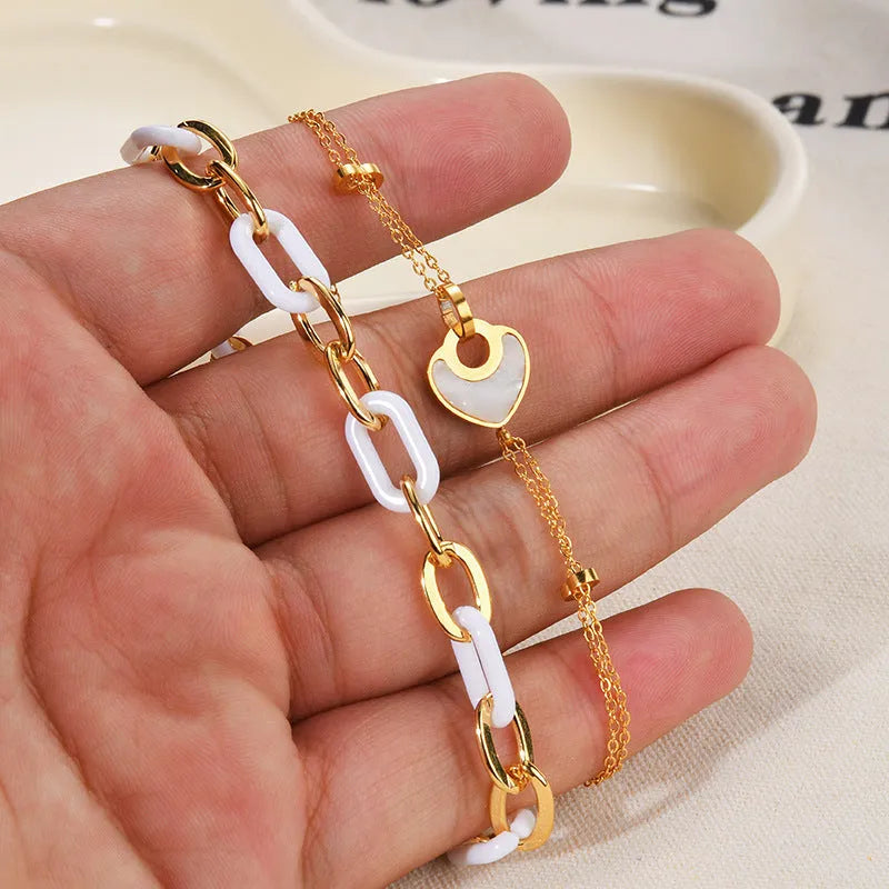 Women's stainless steel resin heart bracelet with double layer design and electroplated finish