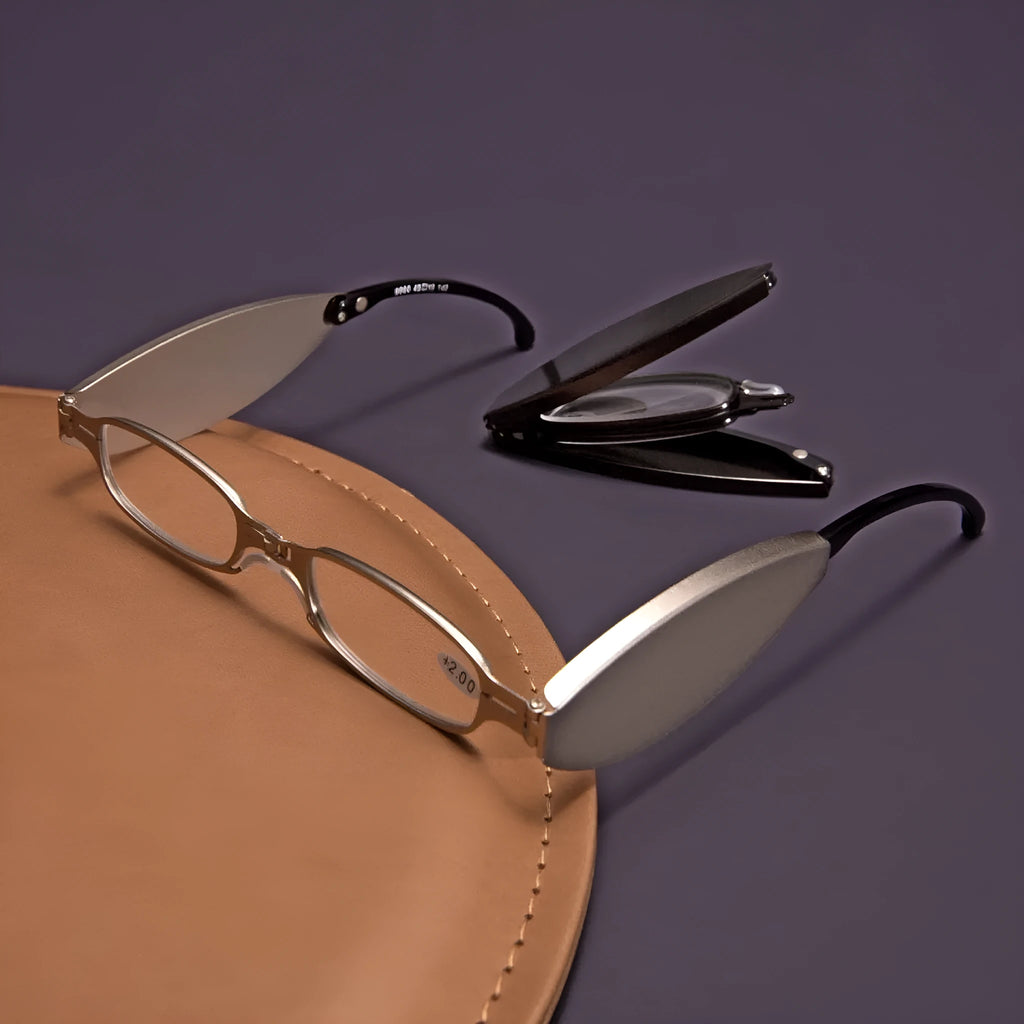 Folding presbyopic glasses with retro ring detailing on black or silver anti-fall frames