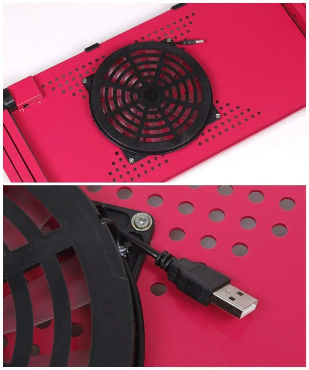 Adjustable black laptop stand desk with mouse pad and USB cooling fan, folded for storage, on a wooden floor