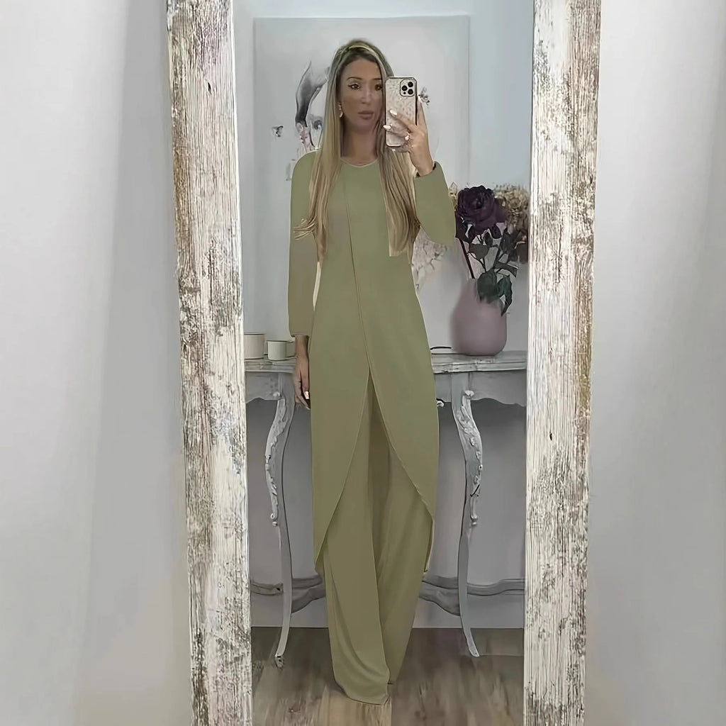 Casual black polyester two-piece lounge set with long sleeve top and loose trousers on a hanger.