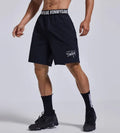 Men's black breathable sports shorts with elastic waistband and loose cropped design